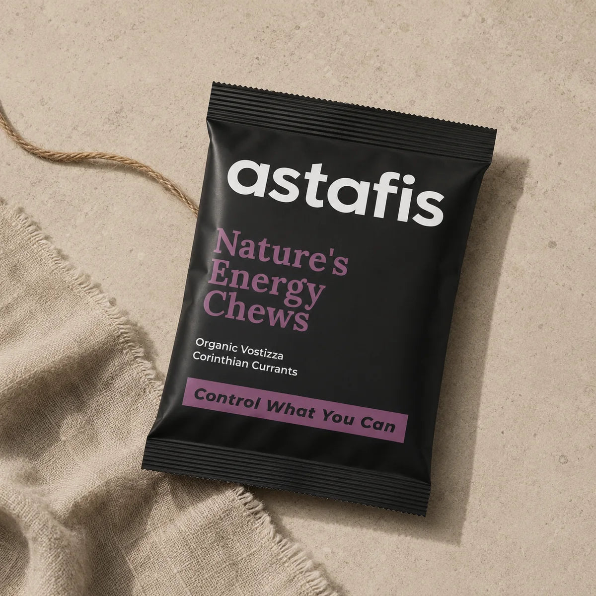 Black Astafis sachet containing PDO Vostizza Corinthian currants