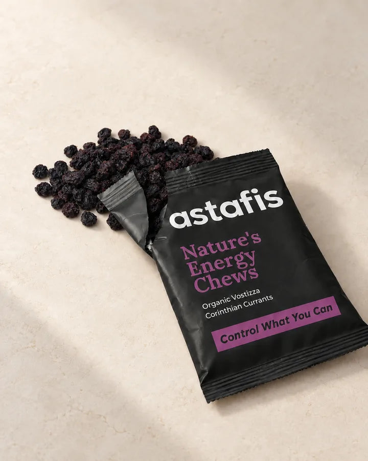 Opened Astafis Nature’s Energy Chews sachet with organic PDO Vostizza Corinthian currants